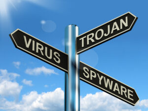 Virus Trojan Spyware Signpost Showing Internet Or Computer Threats